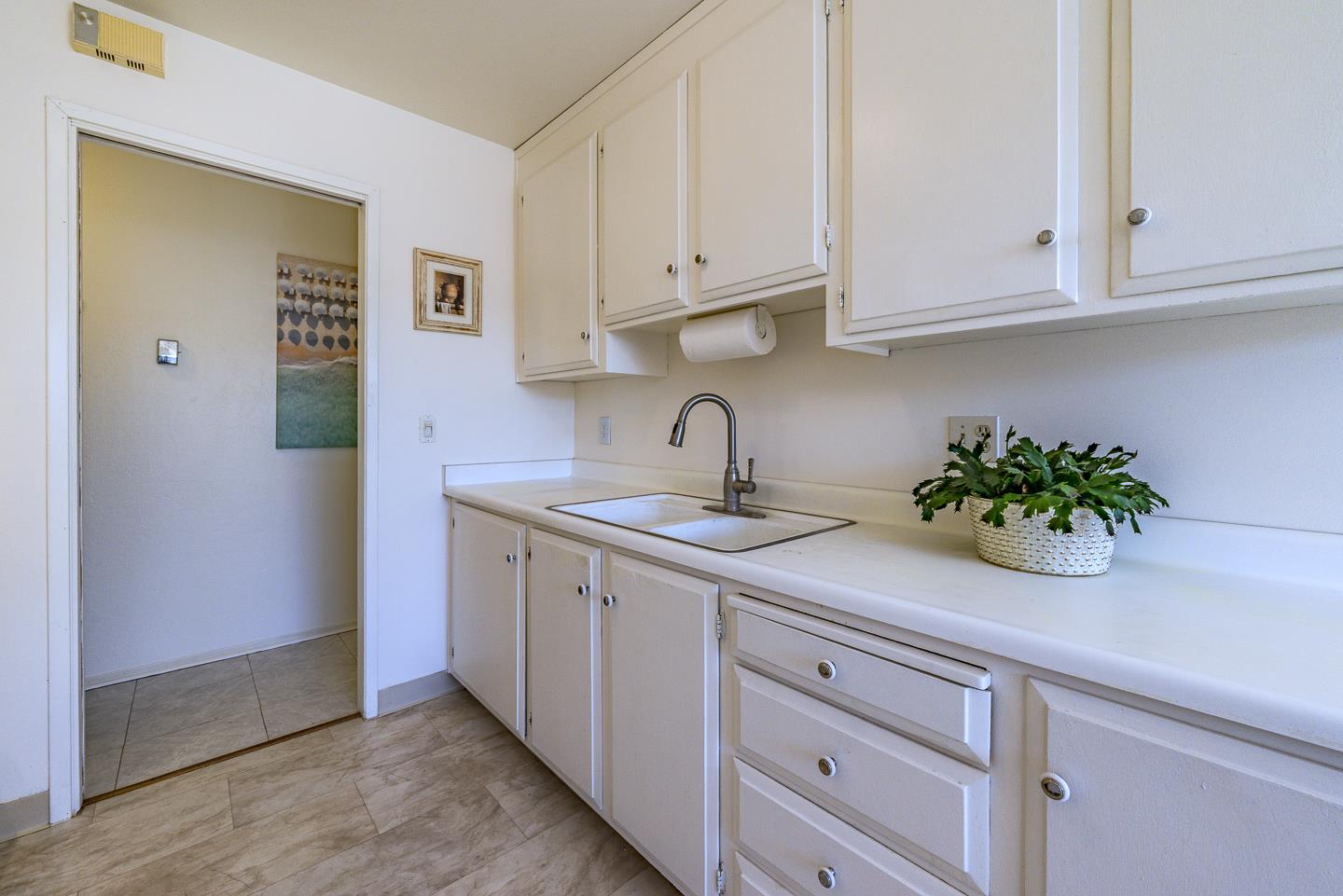 3350 Hardin Way Soquel, CA 95073 - Photo 16 of 45 a kitchen with stainless steel appliances white cabinets and a sink