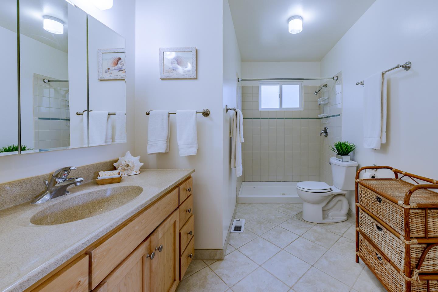 3350 Hardin Way Soquel, CA 95073 - Photo 18 of 45 a bathroom with a granite countertop toilet sink and mirror