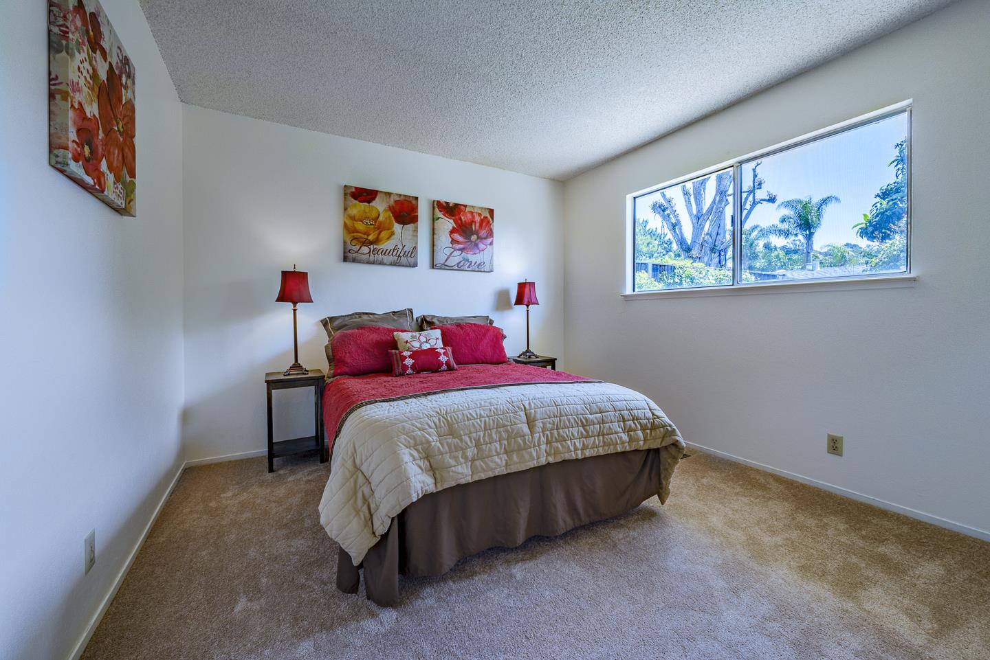 3350 Hardin Way Soquel, CA 95073 - Photo 19 of 45 a bedroom with a bed and a painting on the wall