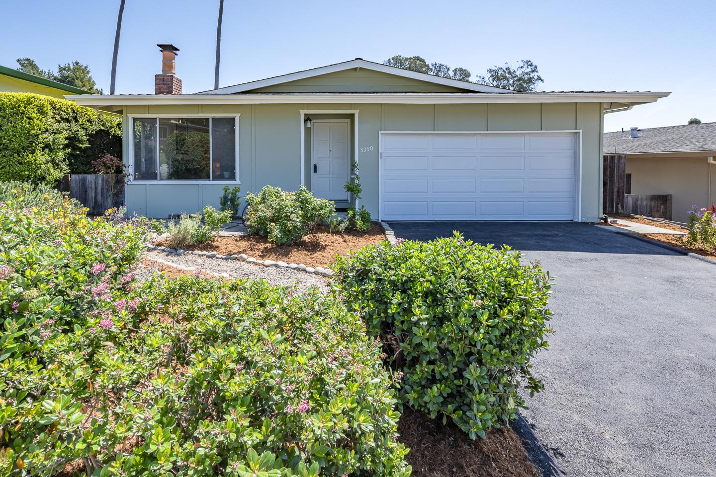 3350 Hardin Way Soquel, CA 95073 - Photo 2 of 45 a front view of a house with garden