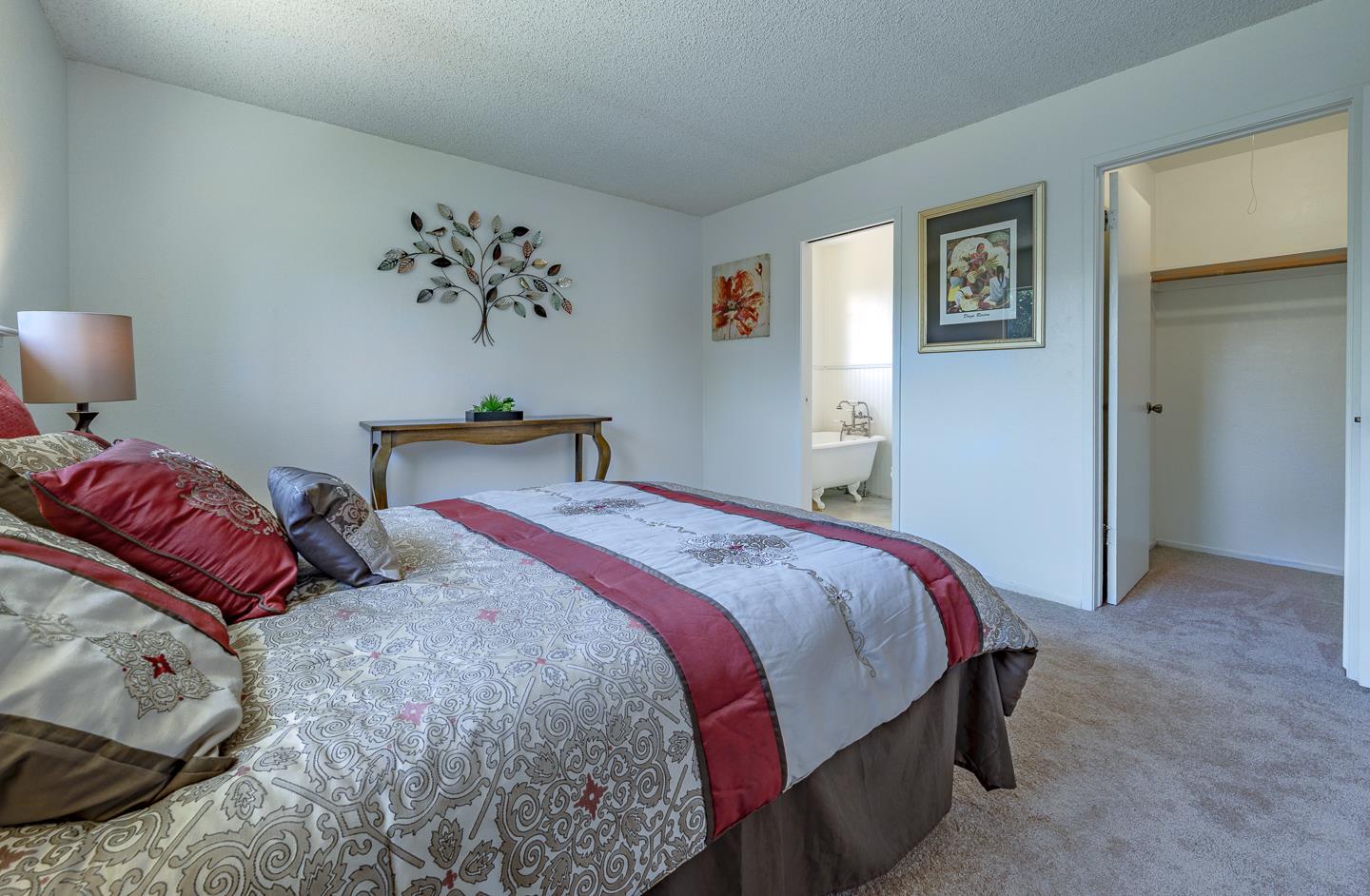 3350 Hardin Way Soquel, CA 95073 - Photo 24 of 45 a bedroom with double bed and a painting on the wall
