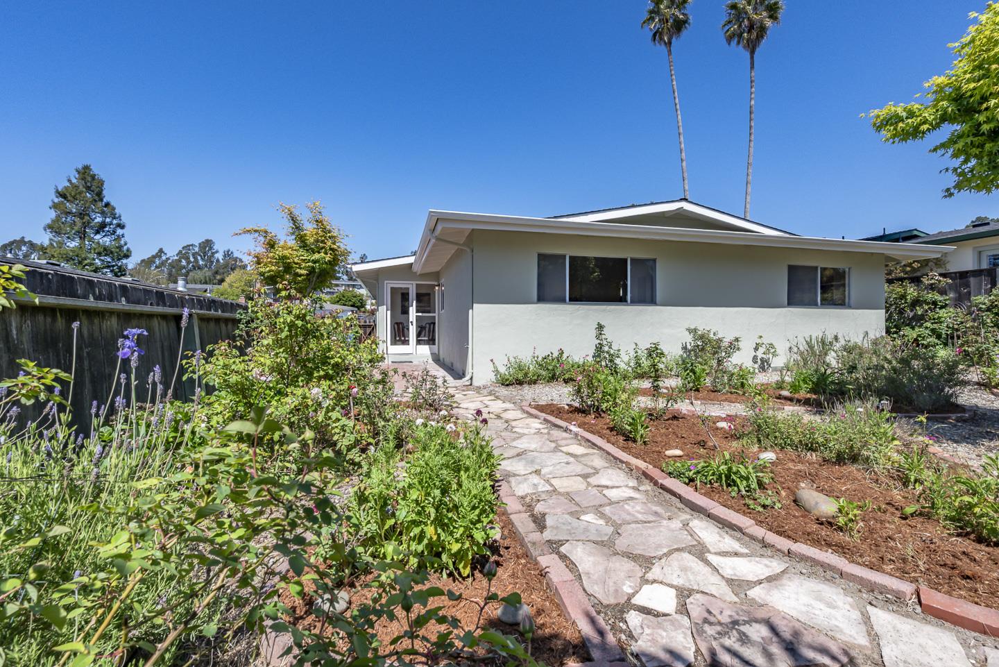 3350 Hardin Way Soquel, CA 95073 - Photo 34 of 45 a front view of a house with lots of green space
