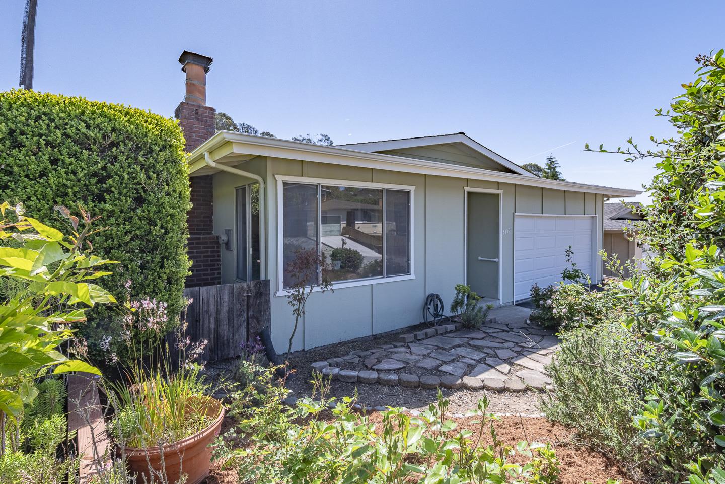 3350 Hardin Way Soquel, CA 95073 - Photo 4 of 45 a front view of a house with a yard
