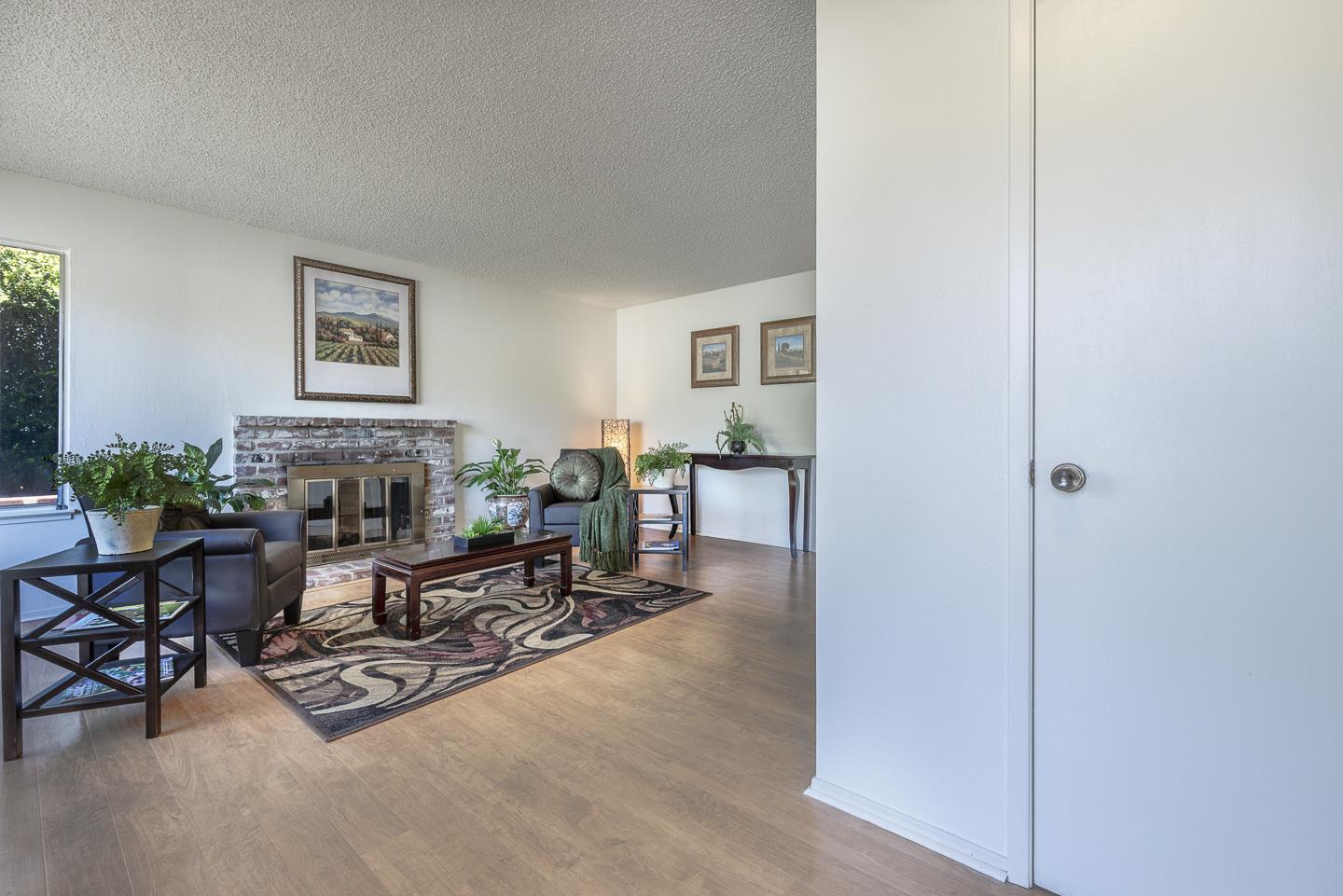 3350 Hardin Way Soquel, CA 95073 - Photo 5 of 45 a living room with furniture and a table