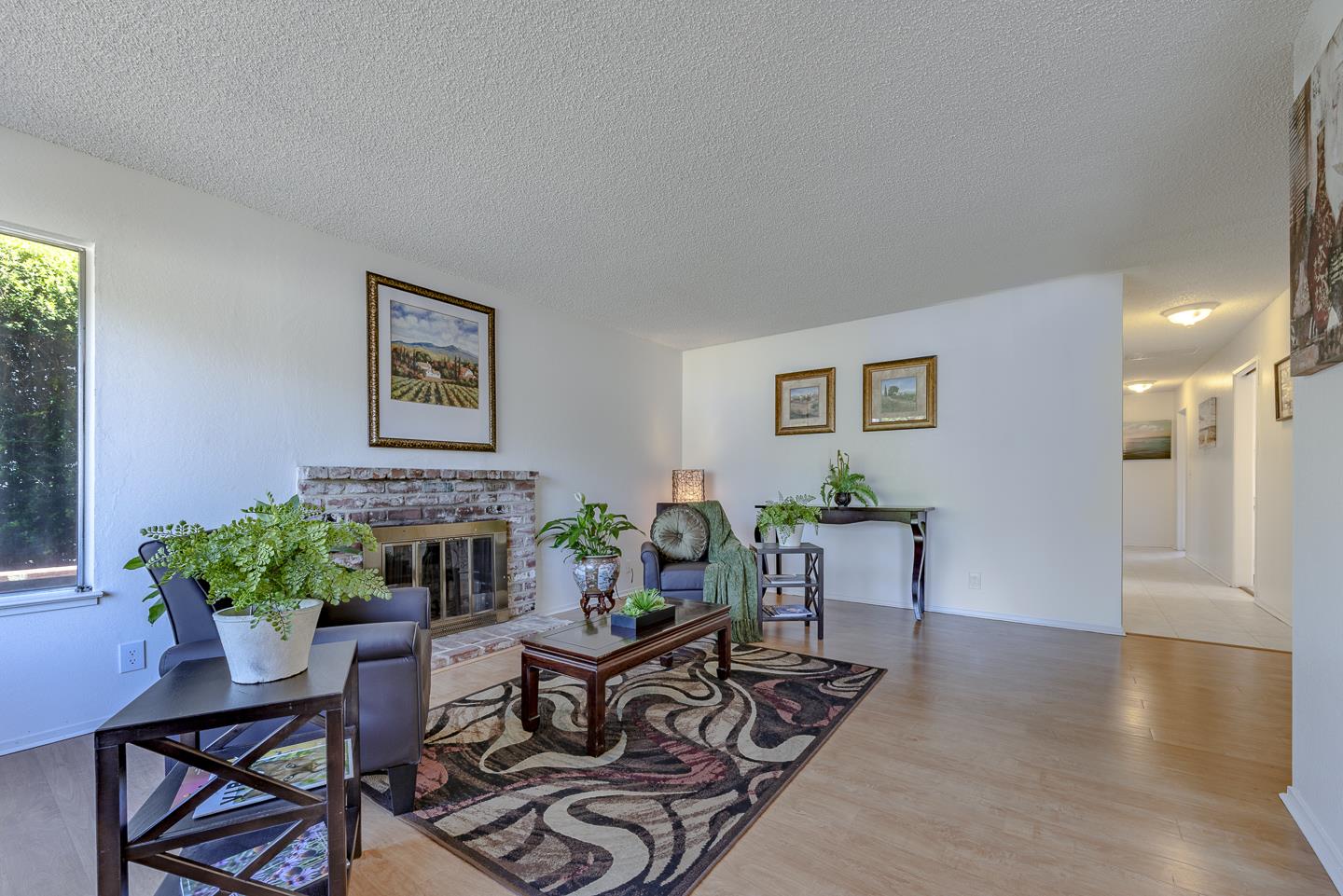 3350 Hardin Way Soquel, CA 95073 - Photo 6 of 45 a living room with furniture and a potted plant