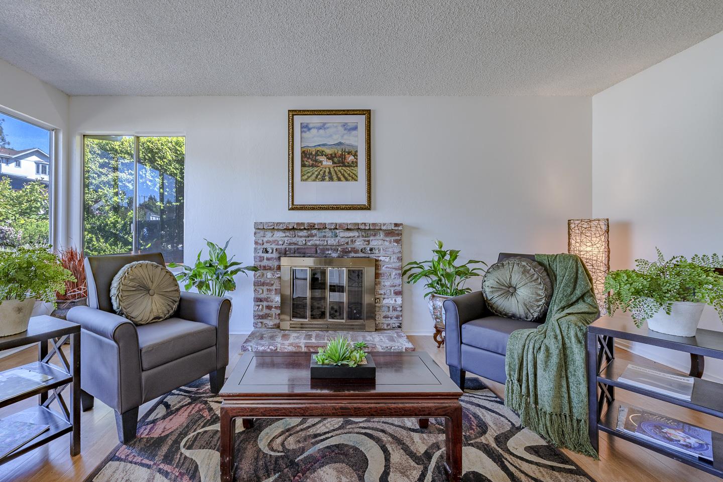 3350 Hardin Way Soquel, CA 95073 - Photo 9 of 45 a living room with furniture and a fireplace
