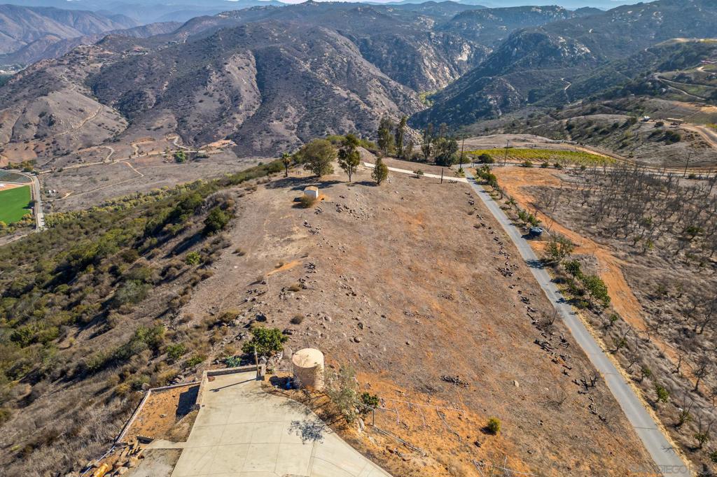 15840 Highland Valley Road Escondido, CA 92025 - Photo 8 of 18 a view of a backyard of a house