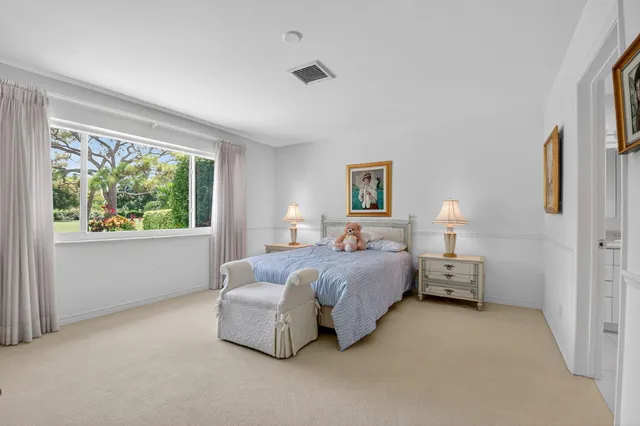 a front view of a house with a yard and porch
