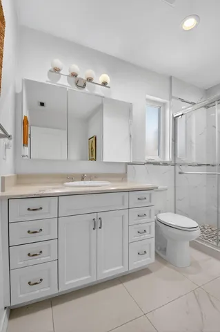 a front view of a house with a yard table and chairs