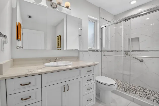 $999,000 | 4860 South Lake Drive, Boynton Beach, FL 33436