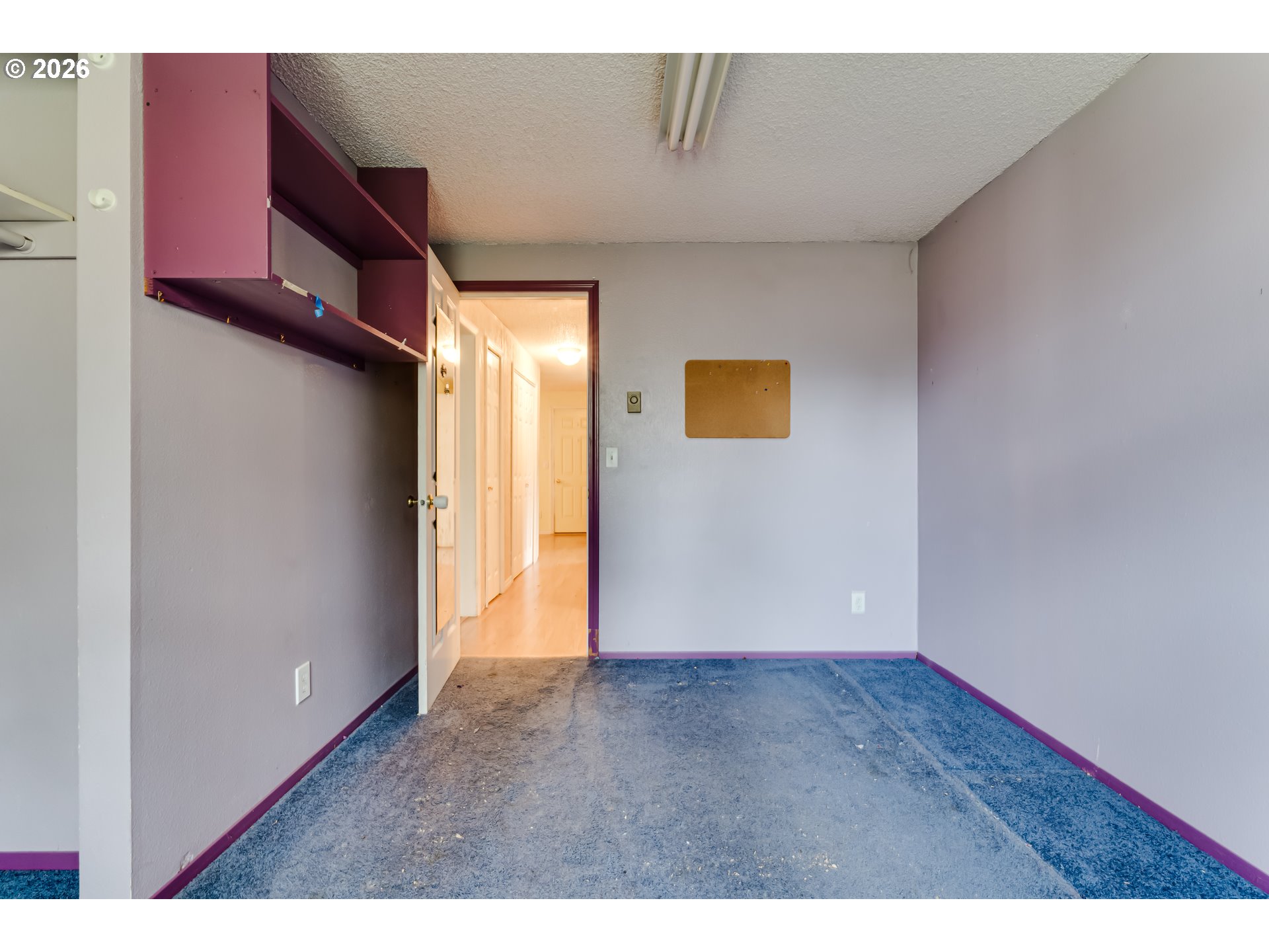 445 Southwest Juniper Street Junction City, OR 97448 - Photo 13 of 36 a view of an empty room with wooden floor