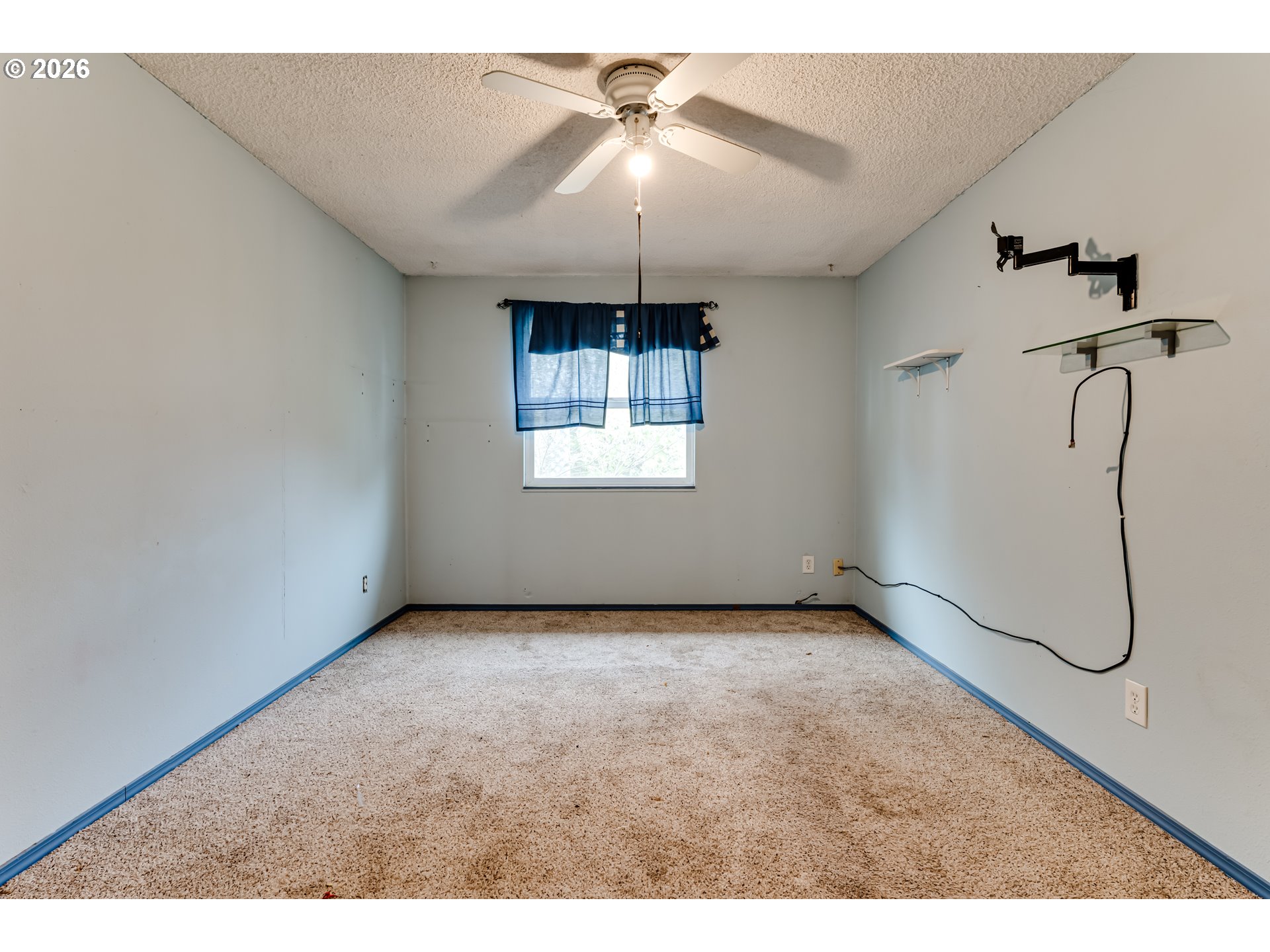 445 Southwest Juniper Street Junction City, OR 97448 - Photo 17 of 36 a view of an empty room with windows