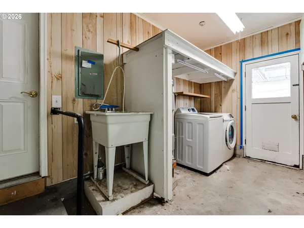 a utility room with dryer and washer