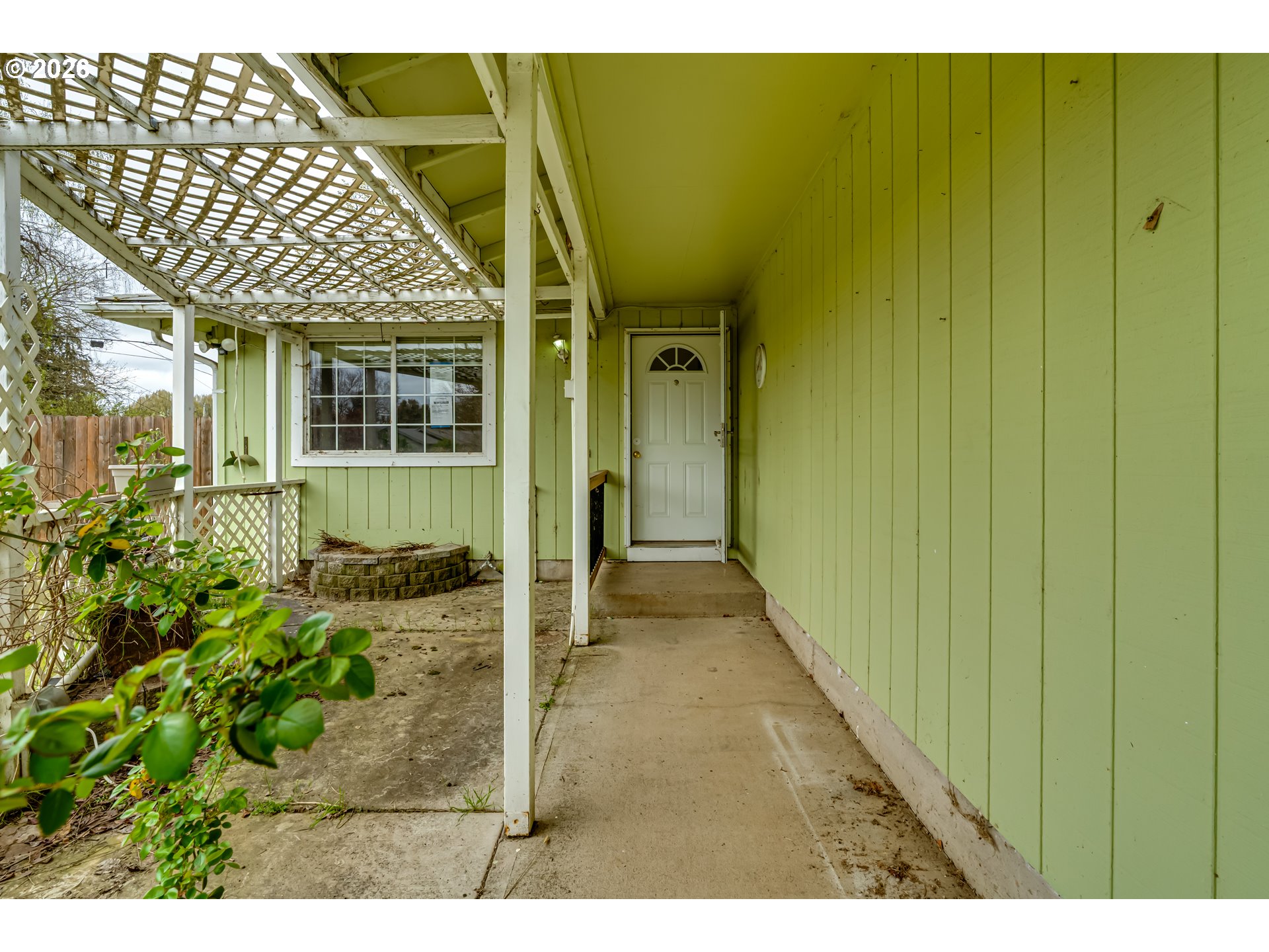 445 Southwest Juniper Street Junction City, OR 97448 - Photo 28 of 36 a view of a house with a porch