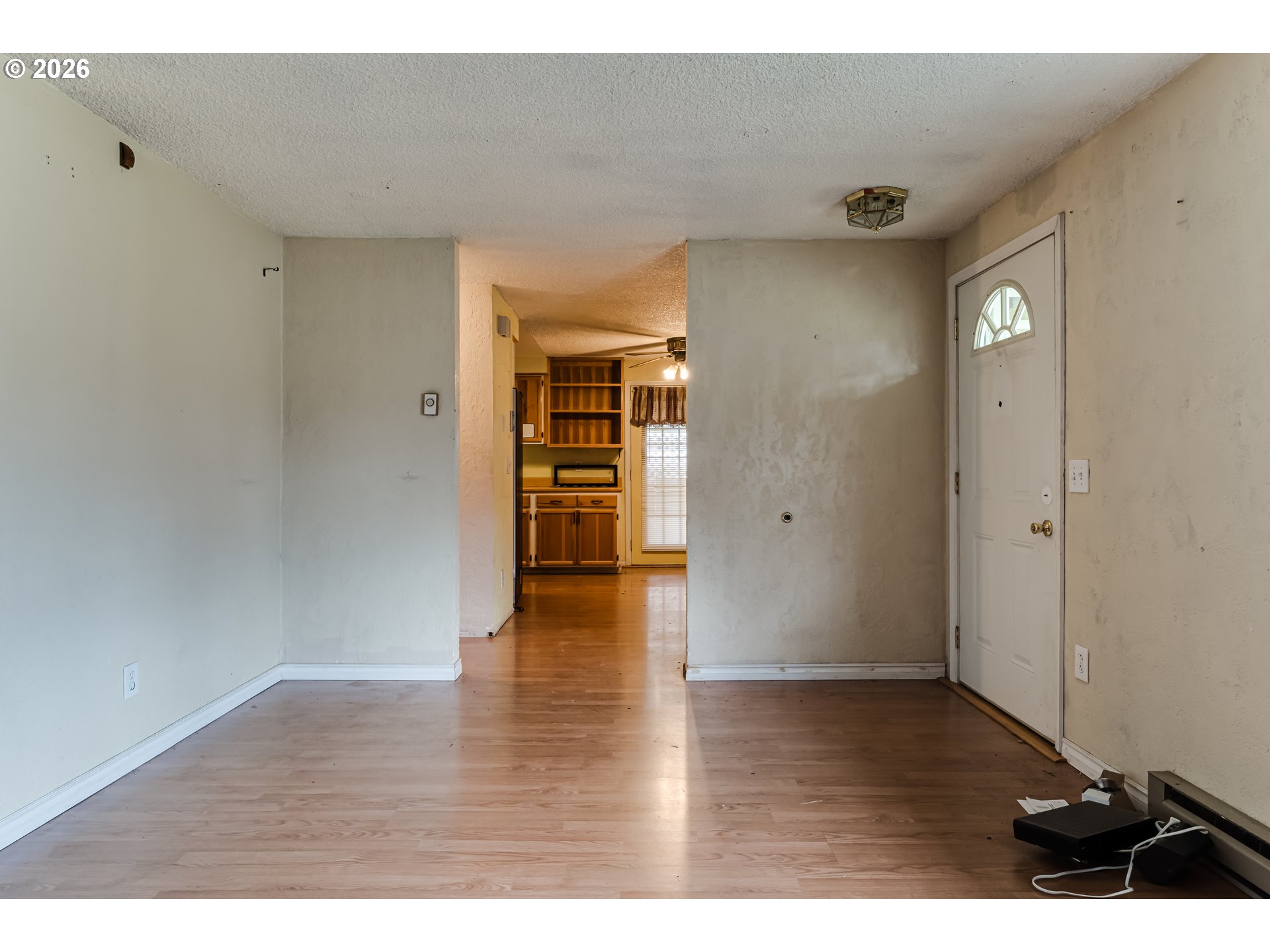 445 Southwest Juniper Street Junction City, OR 97448 - Photo 4 of 36 a view of empty room with wooden floor