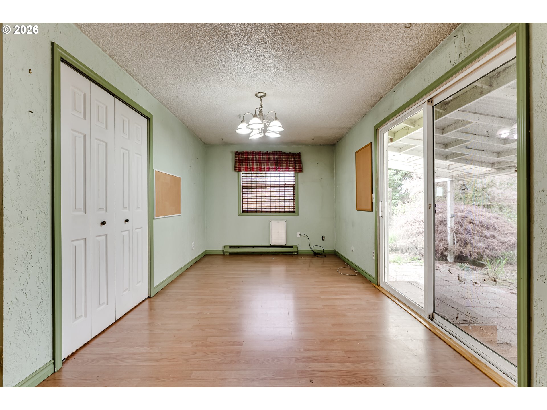 445 Southwest Juniper Street Junction City, OR 97448 - Photo 9 of 36 a view interior of a house wooden floor and windows