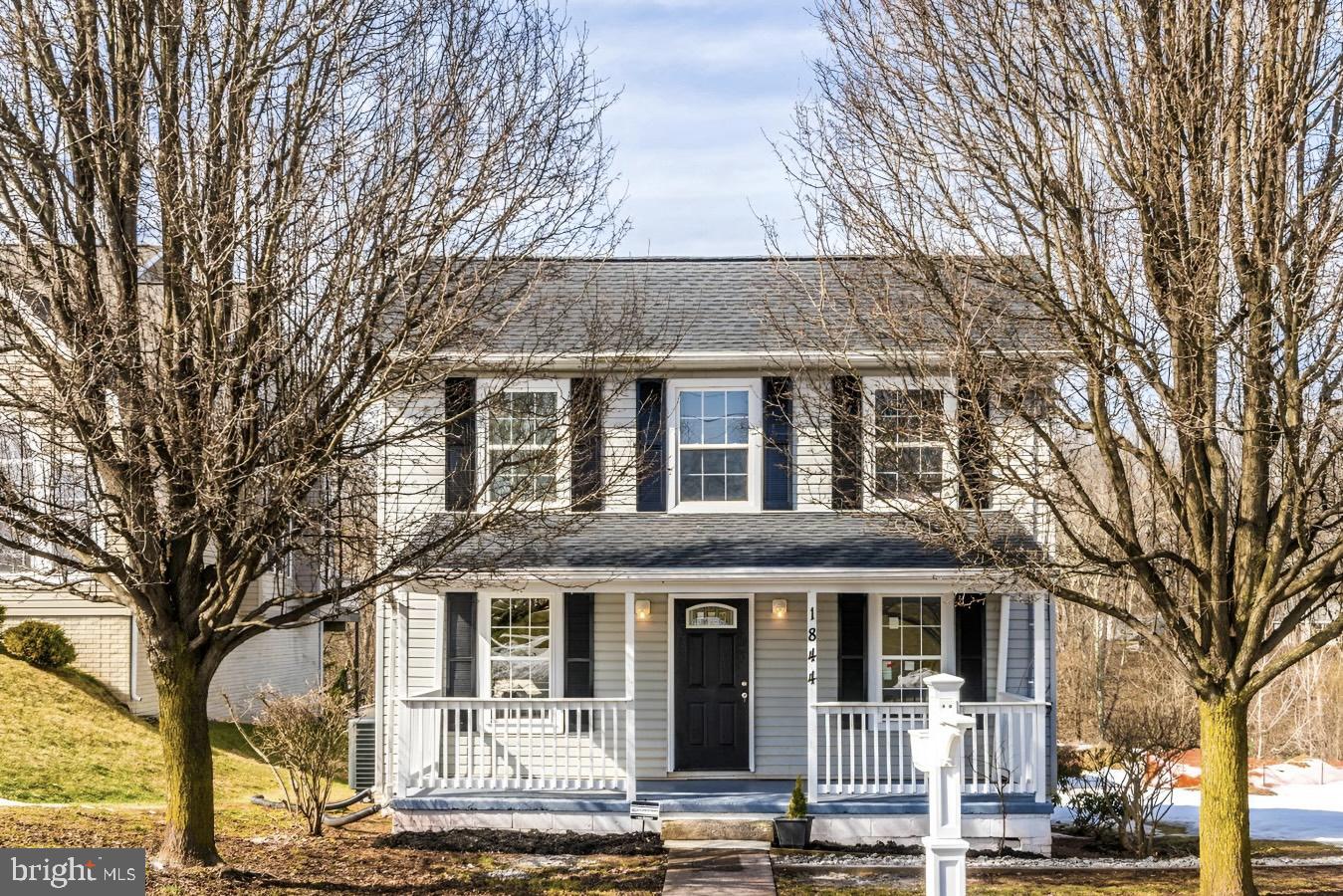 1844 Pleasant View Road Adamstown, MD 21710 - Photo 1 of 2 a front view of a house with yard