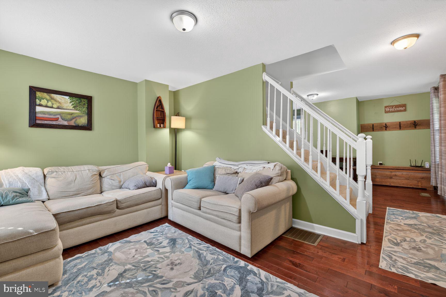 1844 Pleasant View Road Adamstown, MD 21710 - Photo 11 of 29 a living room with furniture and a stairs