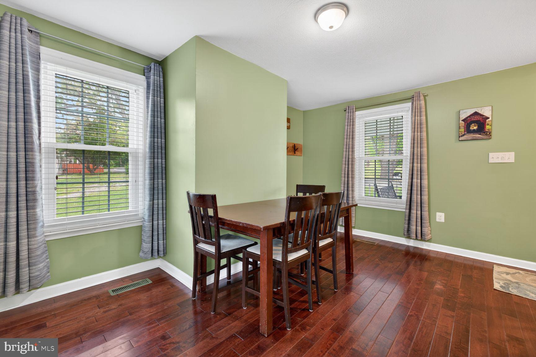 1844 Pleasant View Road Adamstown, MD 21710 - Photo 12 of 29 a view of a dining room with furniture and wooden floor