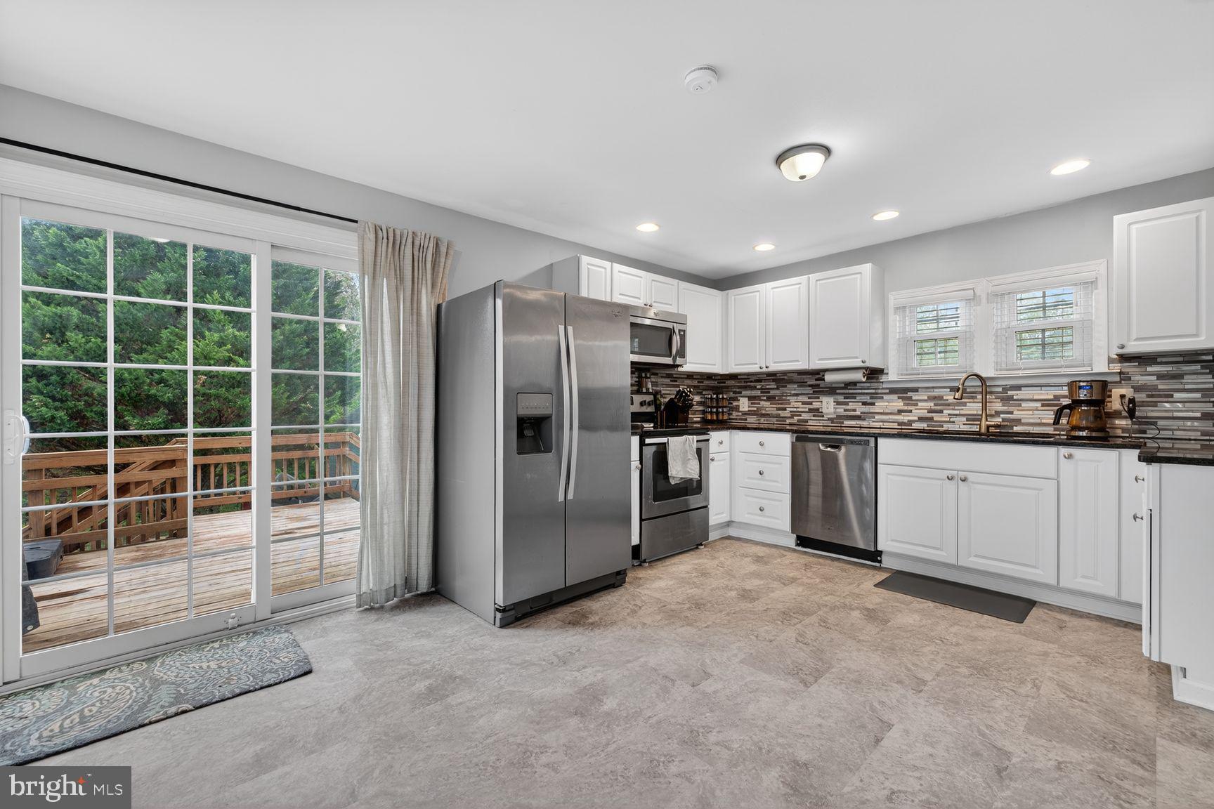 1844 Pleasant View Road Adamstown, MD 21710 - Photo 14 of 29 a kitchen with a refrigerator and window