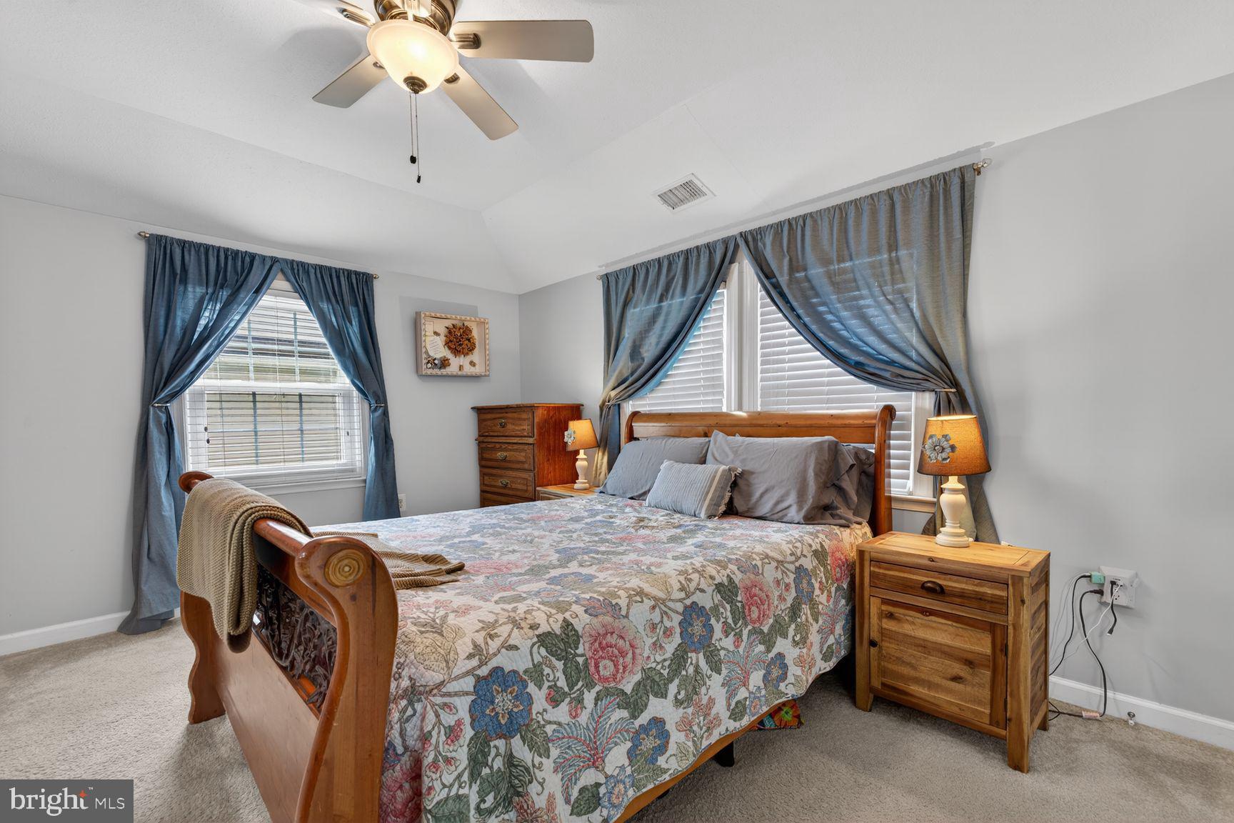 1844 Pleasant View Road Adamstown, MD 21710 - Photo 20 of 29 a bedroom with a bed and a chandelier