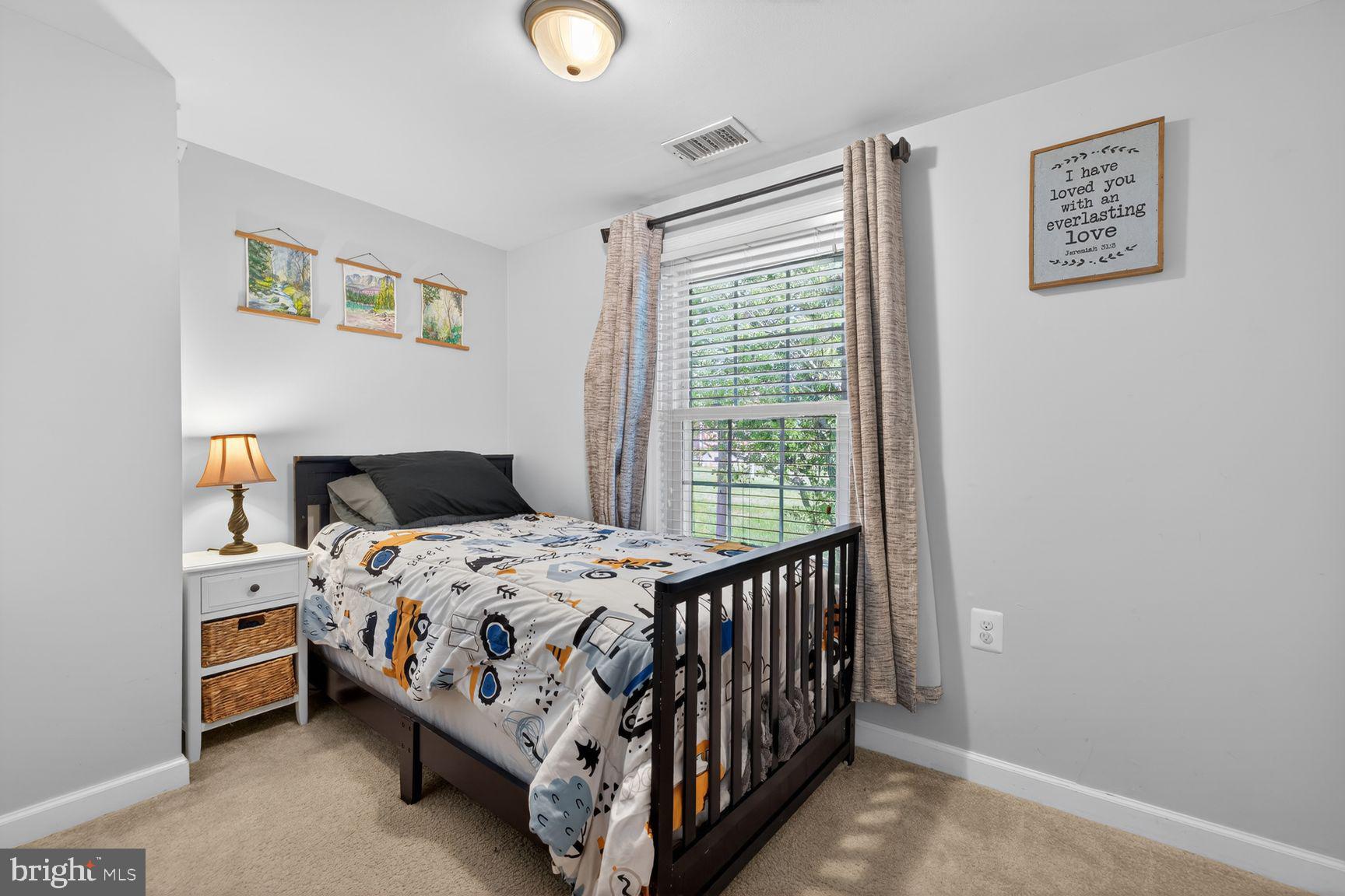 1844 Pleasant View Road Adamstown, MD 21710 - Photo 23 of 29 a bedroom with a bed and a window
