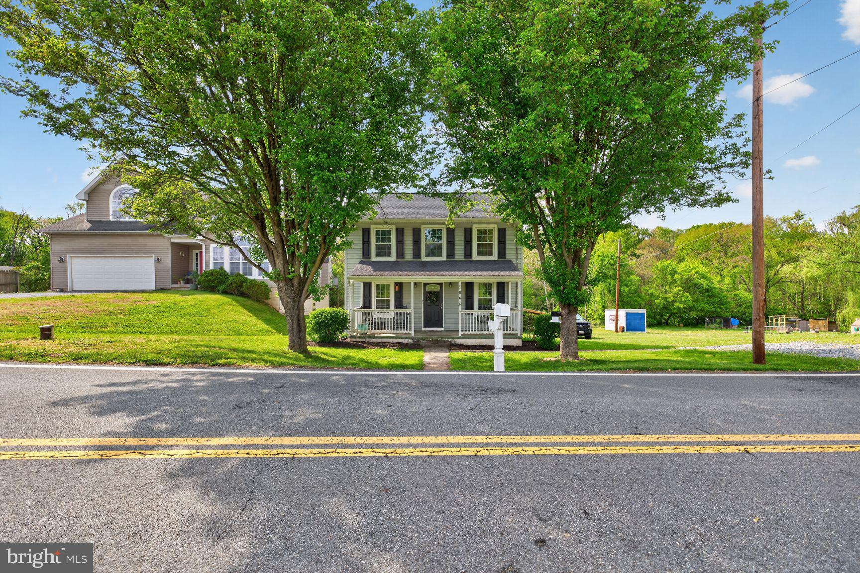 1844 Pleasant View Road Adamstown, MD 21710 - Photo 29 of 29 a view of a house with a yard and large trees