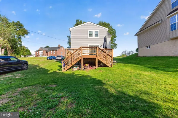 a view of a house with a big yard