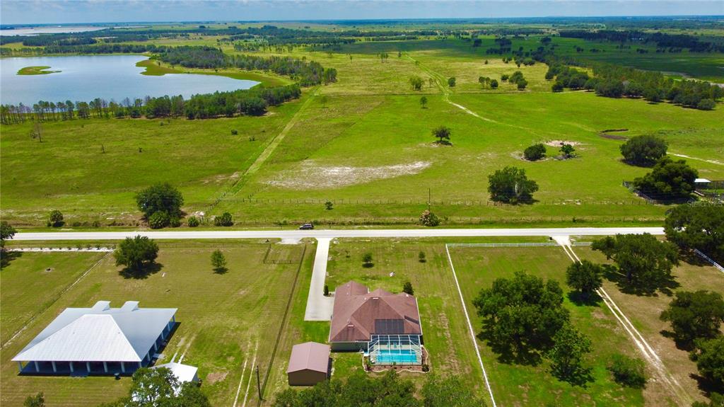 3934 Connersville Road Bartow, FL 33830 - Photo 70 of 81 an aerial view of residential houses with outdoor space and lake view