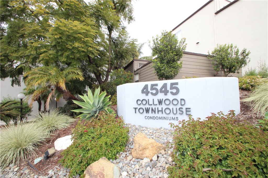 4545 Collwood Boulevard, Unit 19 San Diego, CA 92115 - Photo 20 of 20 a sign that is sitting on a brick wall