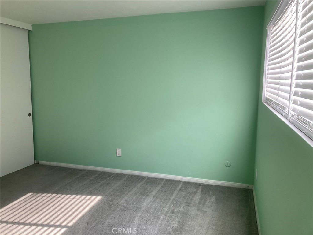 4545 Collwood Boulevard, Unit 19 San Diego, CA 92115 - Photo 6 of 20 a view of an empty room and window