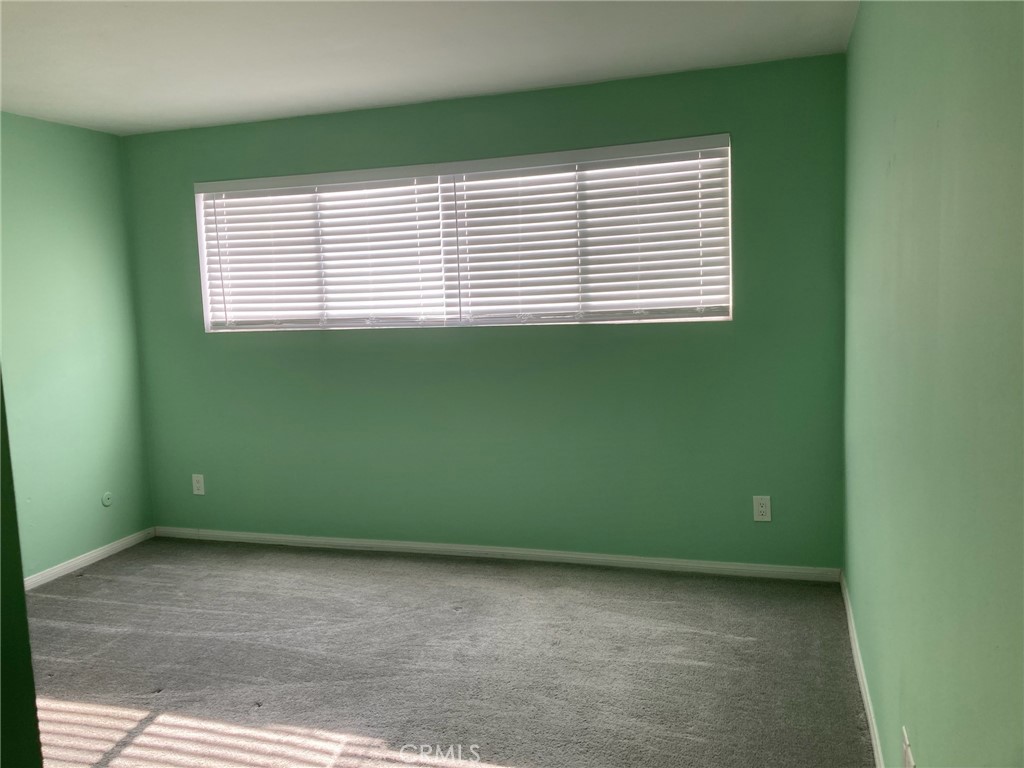 4545 Collwood Boulevard, Unit 19 San Diego, CA 92115 - Photo 8 of 20 a view of a room that has a window