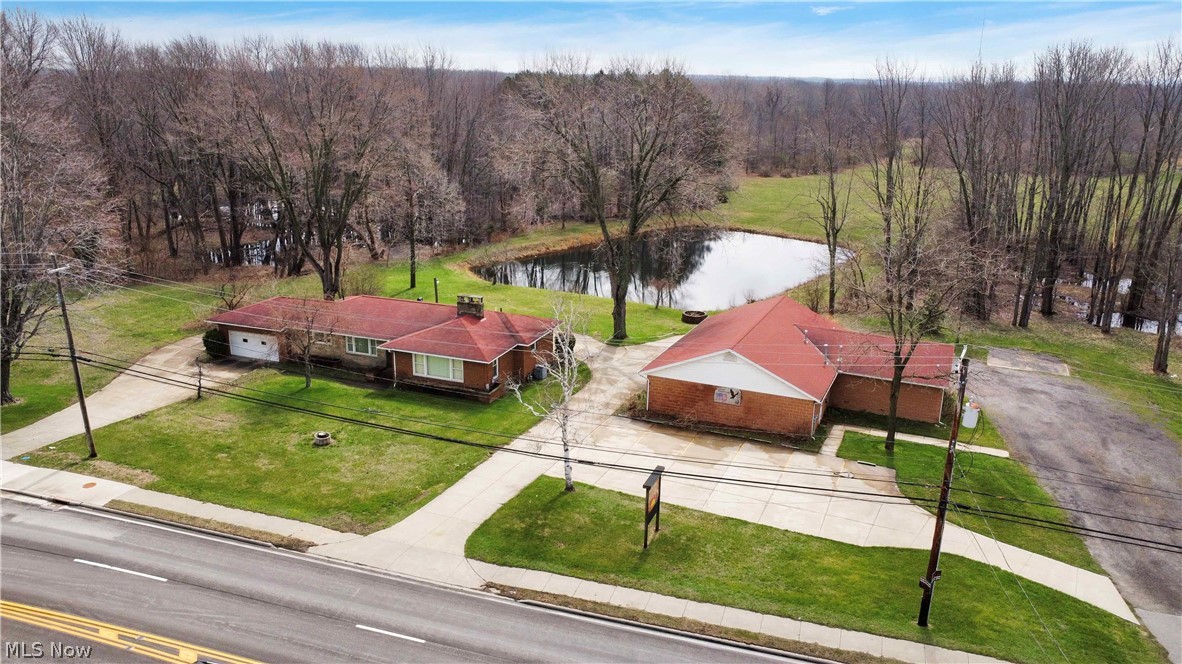 5500 North Ridge Road Madison, OH 44057 - Photo 3 of 49 View of subject property with a large body of water
