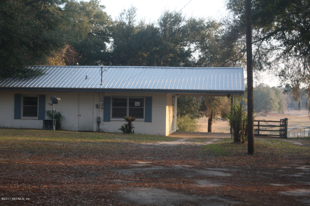 308 Swan Lake Road Melrose, FL 32666 - Photo 1 of 7 Concrete Block home on Lake Swan