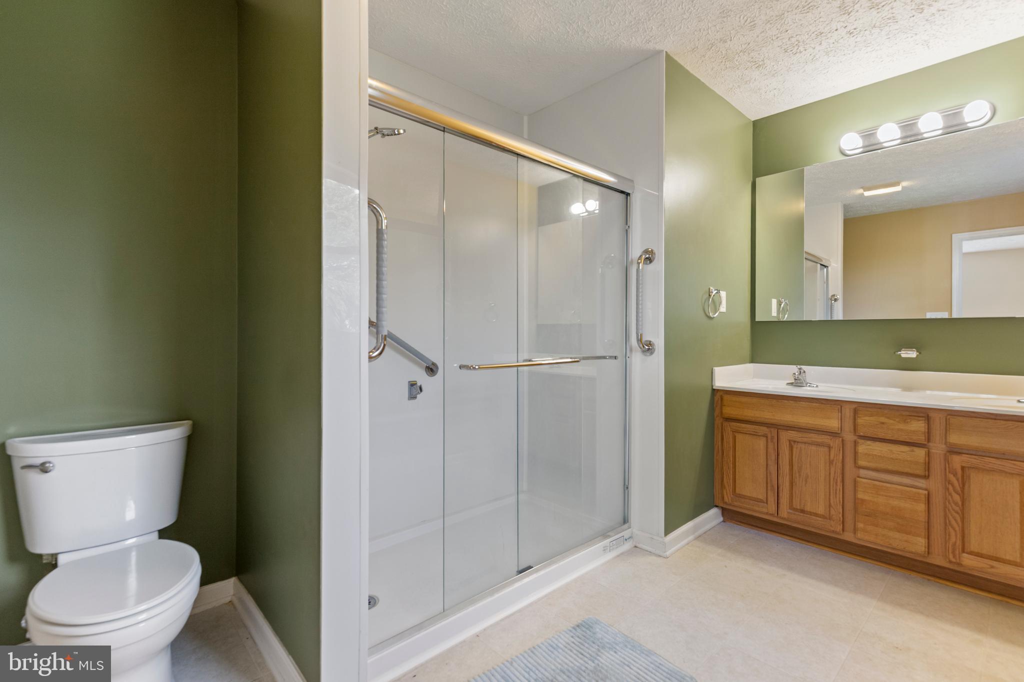 5 Hite Court Luray, VA 22835 - Photo 16 of 40 a bathroom with a granite countertop sink toilet and shower