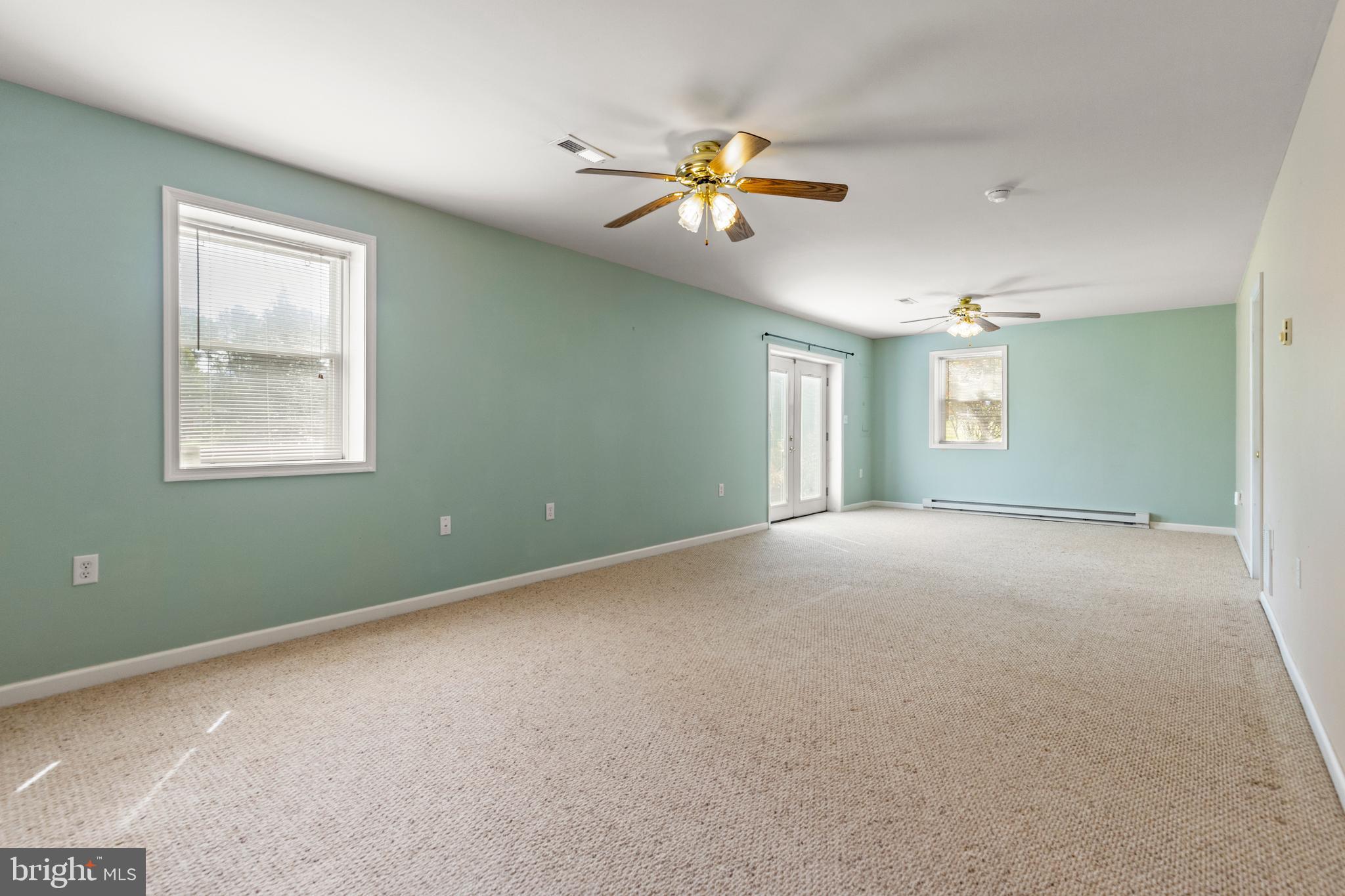 5 Hite Court Luray, VA 22835 - Photo 18 of 40 a view of a livingroom with a ceiling fan and window