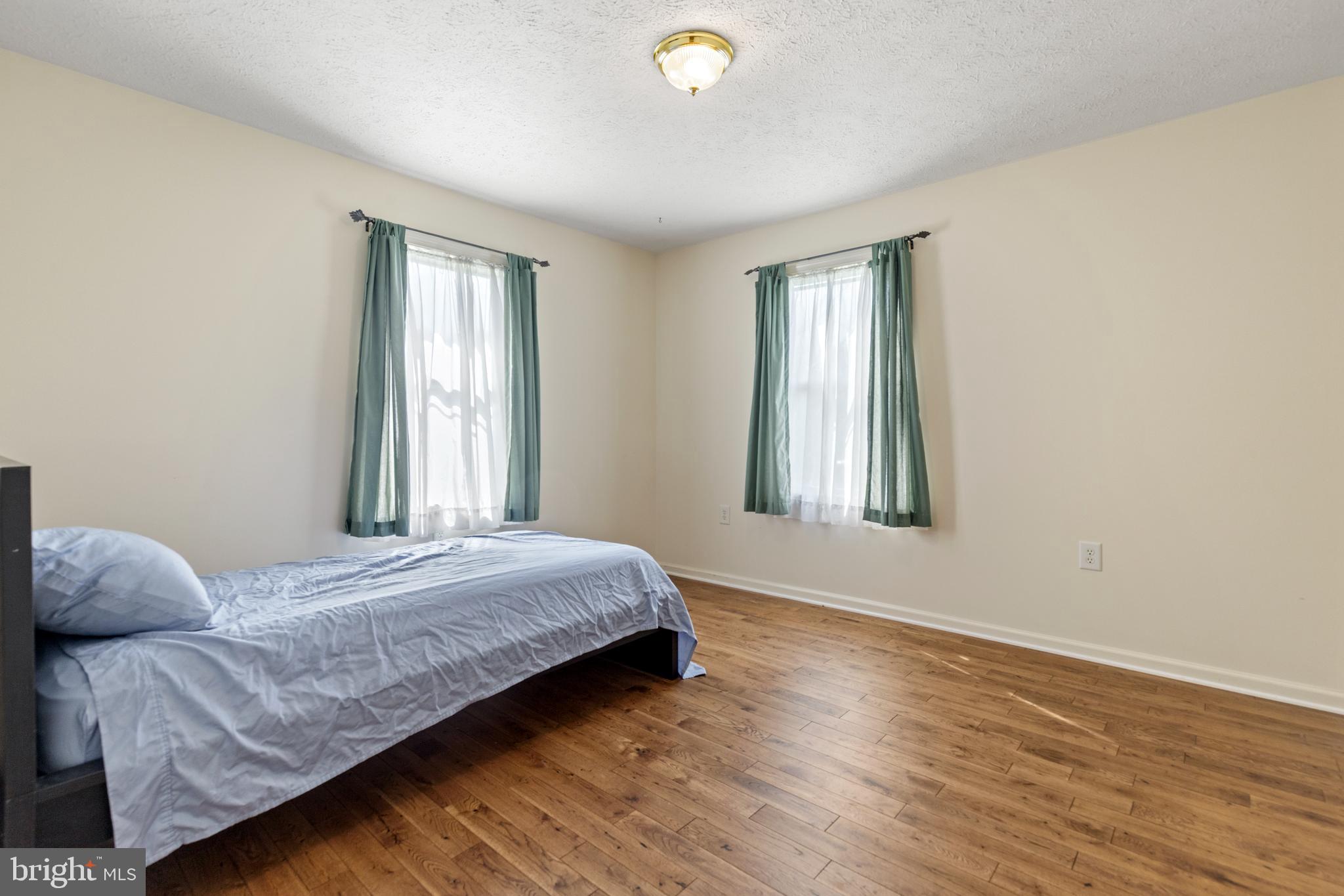 5 Hite Court Luray, VA 22835 - Photo 20 of 40 a bedroom with a bed and a window