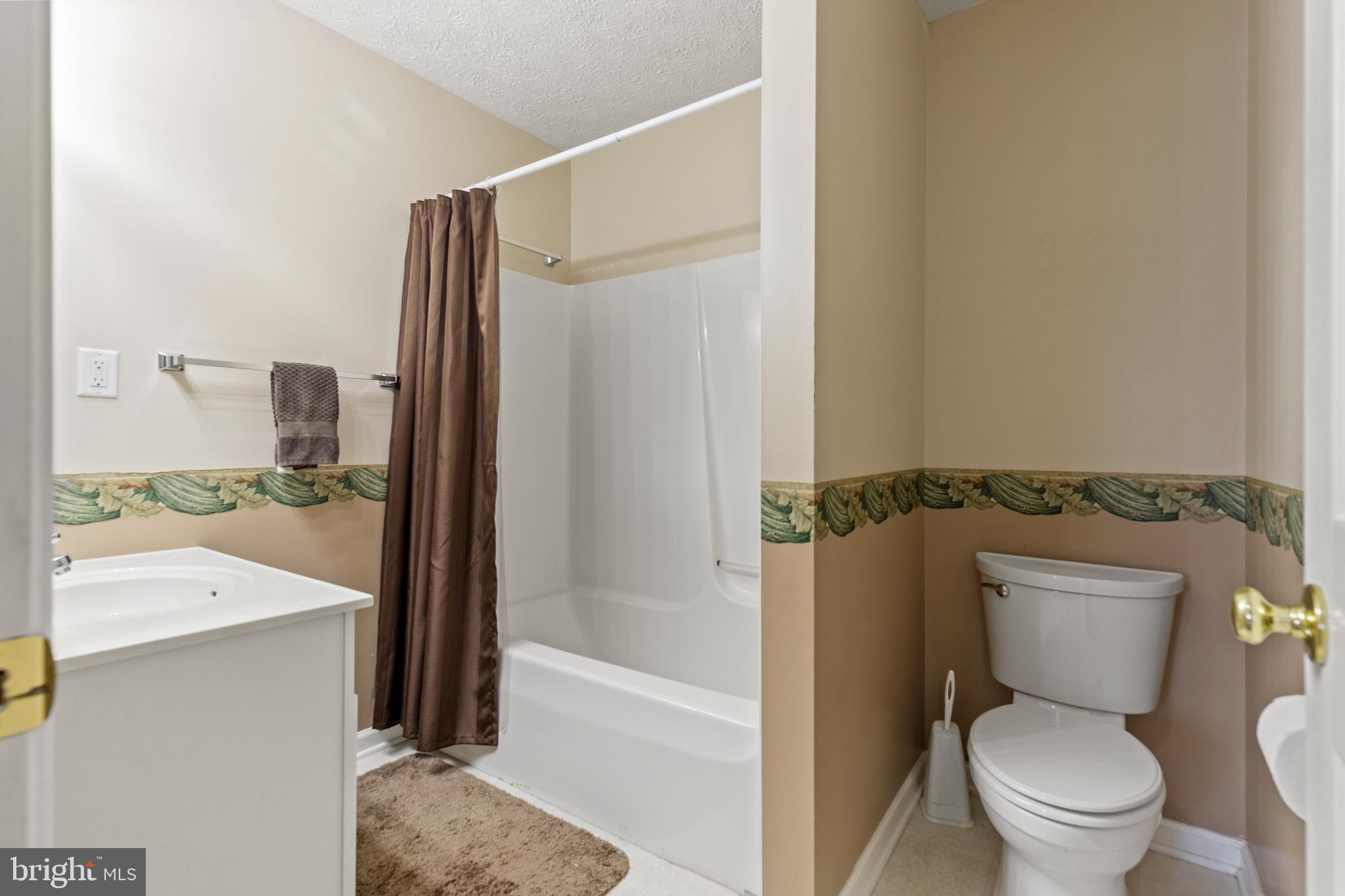 5 Hite Court Luray, VA 22835 - Photo 22 of 40 a bathroom with a granite countertop toilet sink and shower
