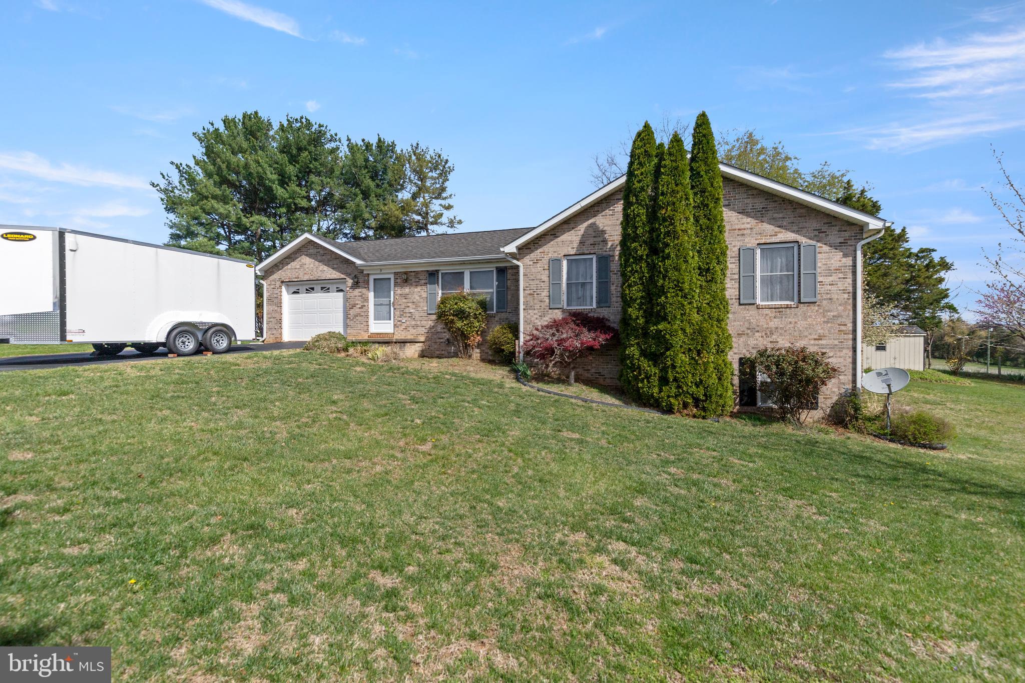5 Hite Court Luray, VA 22835 - Photo 38 of 40 a front view of a house with a yard and garage