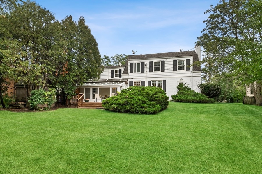 1806 Sunset Road Highland Park, IL 60035 - Photo 22 of 27 a front view of a house with a garden