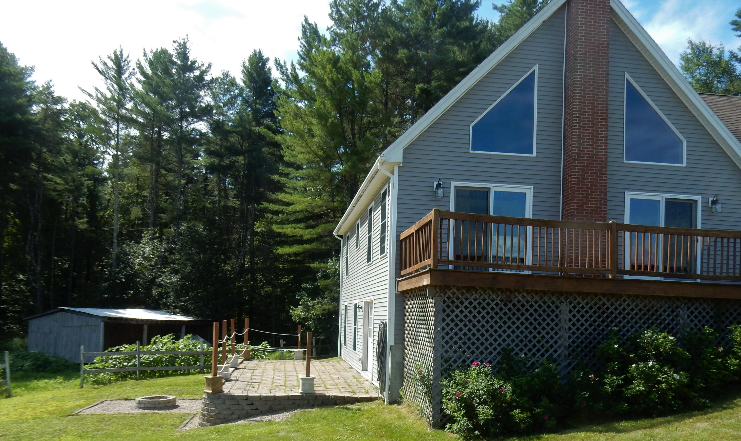 20 Wakefield Road Kennebunk, ME 04043 - Photo 4 of 21 Side Patio with fire pit