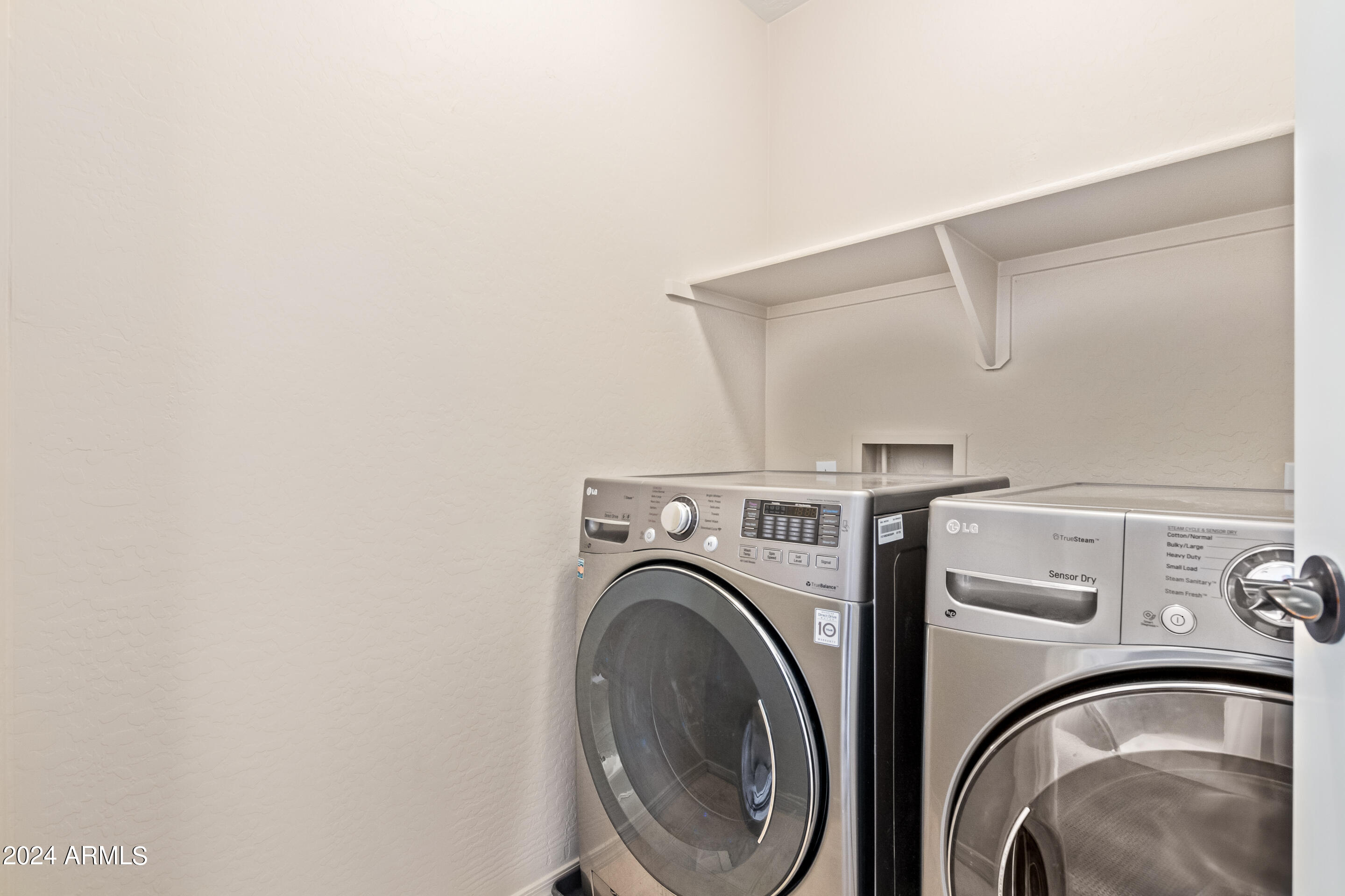 17149 West Rimrock Street Surprise, AZ 85388 - Photo 29 of 46 a utility room with dryer and washer