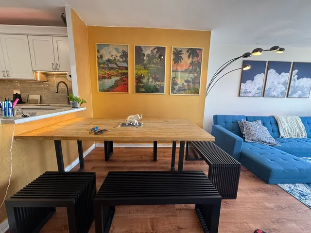 a kitchen with a sink cabinets and appliances