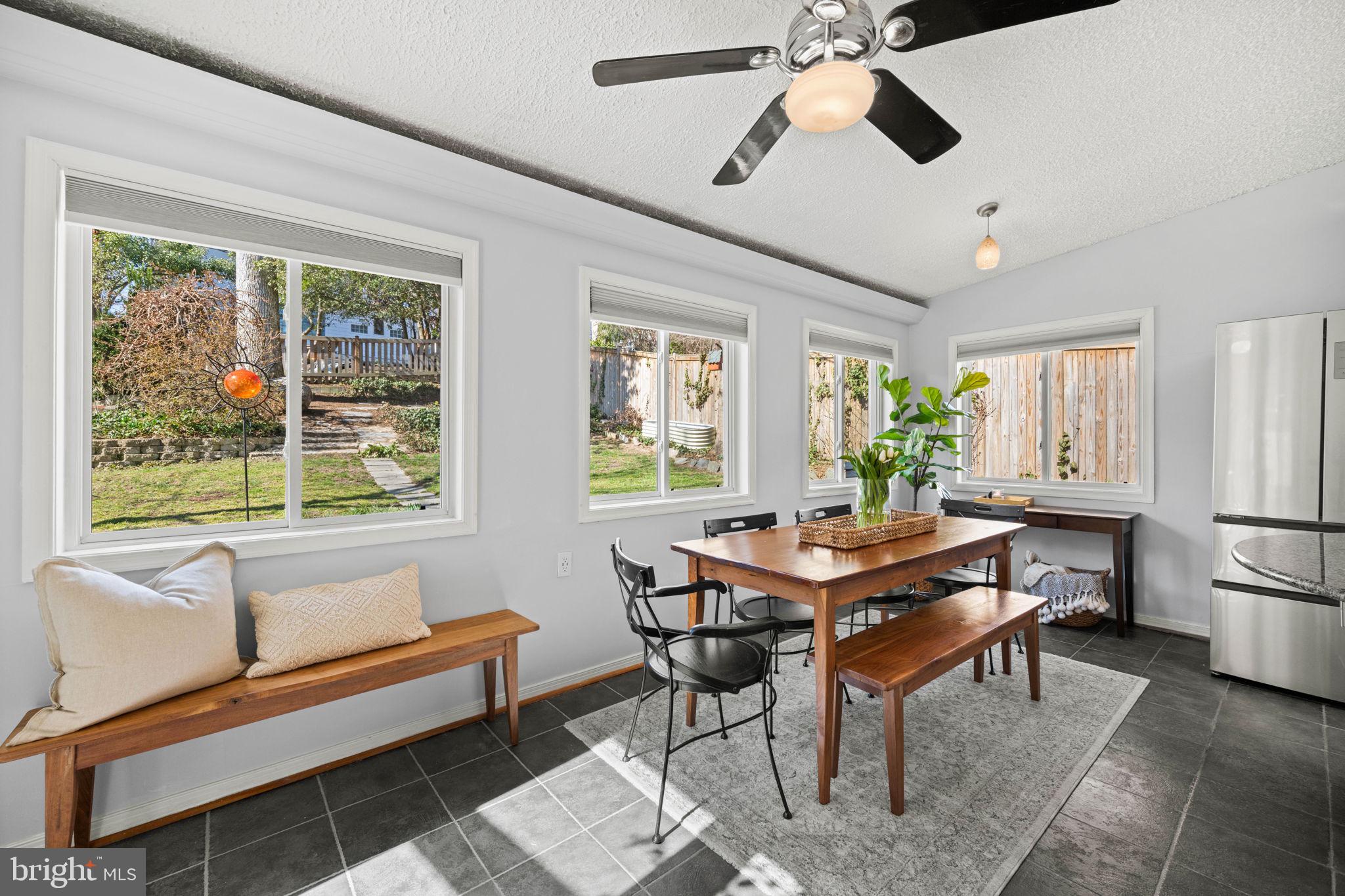 2904 Russell Road Alexandria, VA 22305 - Photo 18 of 52 a living room with furniture a ceiling fan and a window