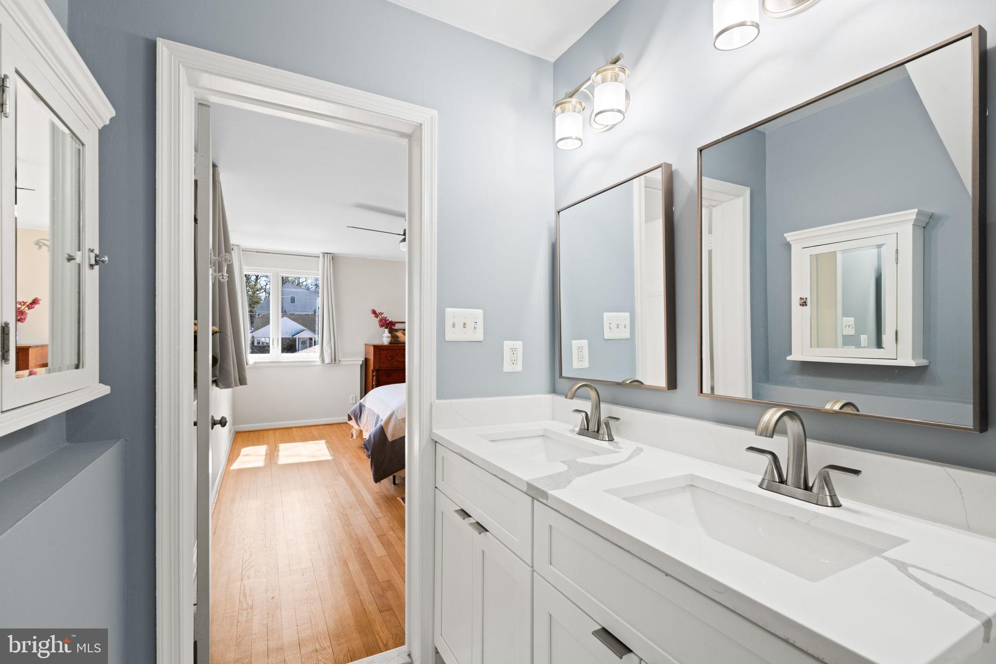2904 Russell Road Alexandria, VA 22305 - Photo 25 of 52 a en suite bathroom with a double vanity sink and mirror