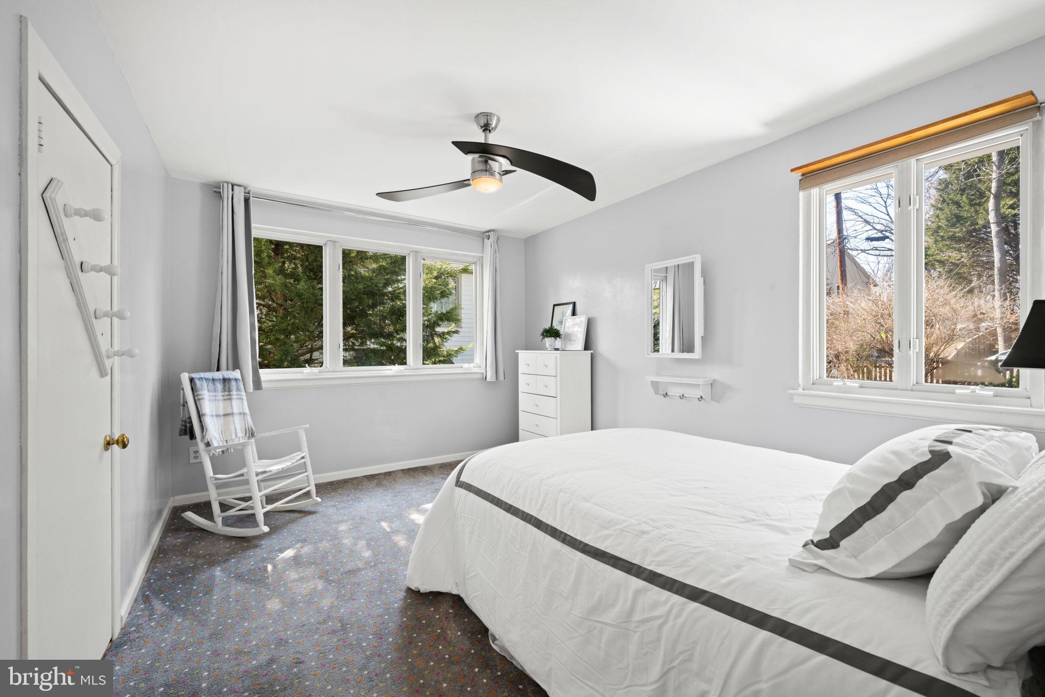 2904 Russell Road Alexandria, VA 22305 - Photo 28 of 52 a bedroom with a large bed and a window