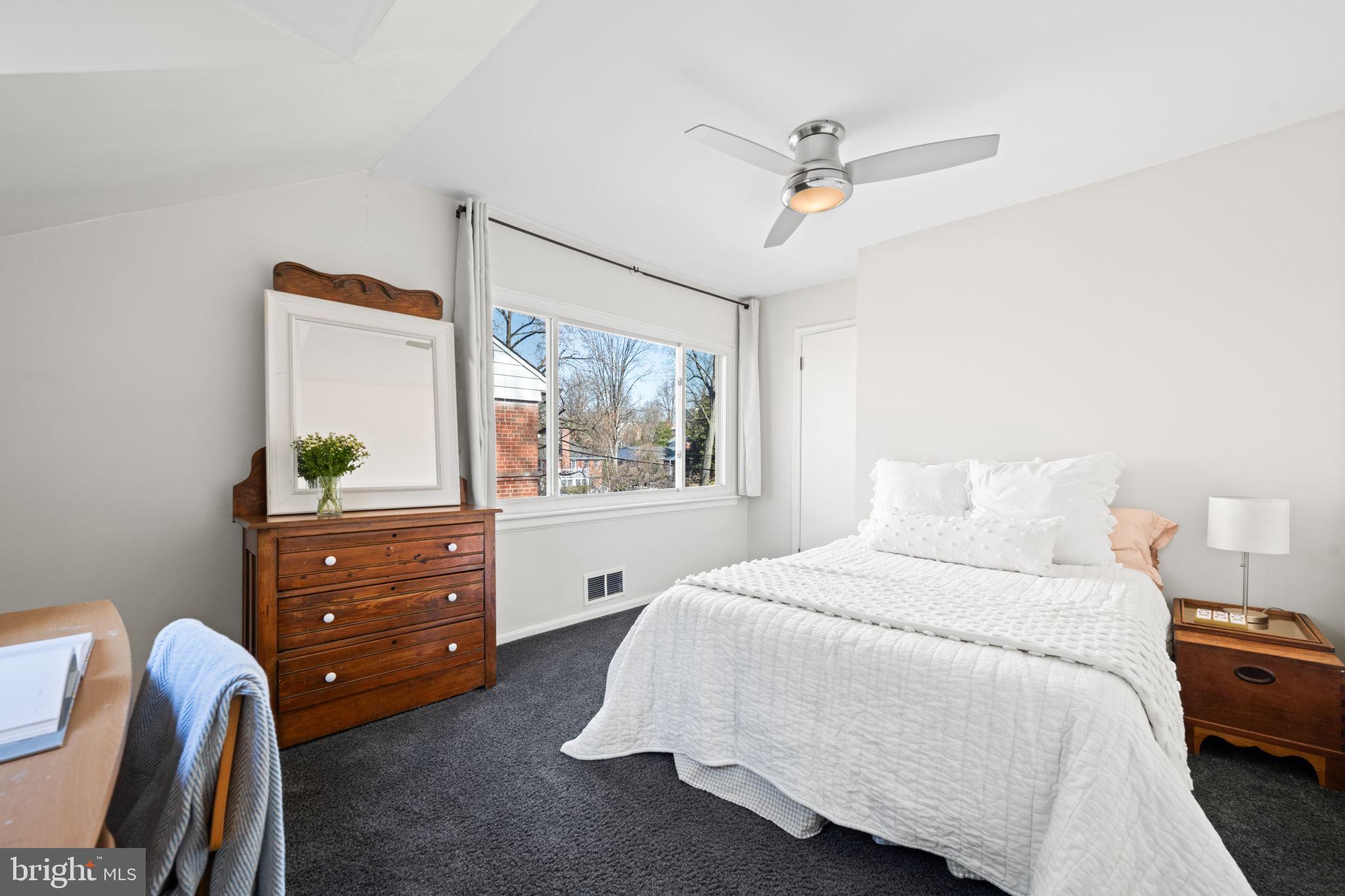 2904 Russell Road Alexandria, VA 22305 - Photo 30 of 52 a bedroom with a bed and a window