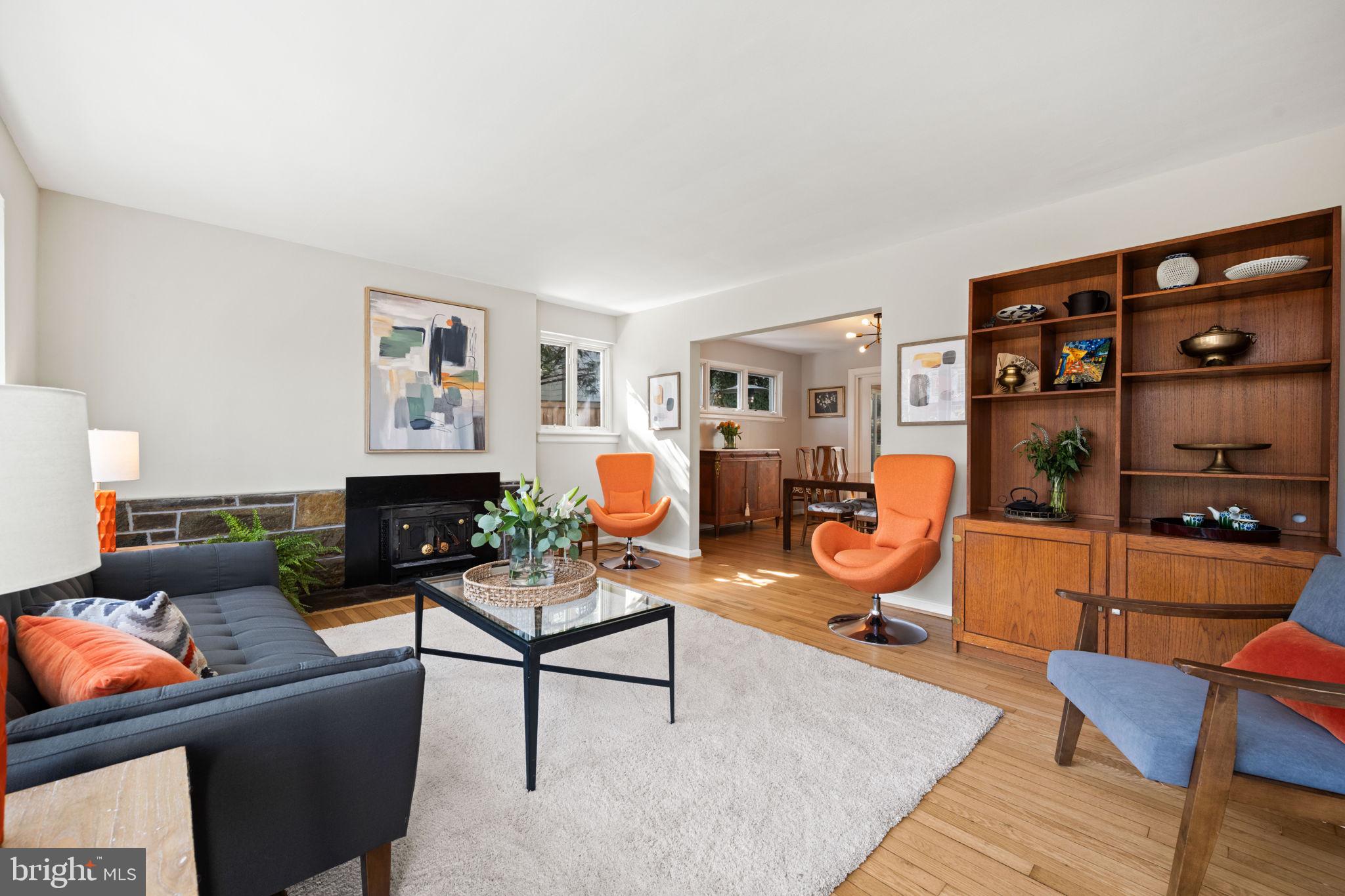 2904 Russell Road Alexandria, VA 22305 - Photo 4 of 52 a living room with furniture a rug and a wall painting
