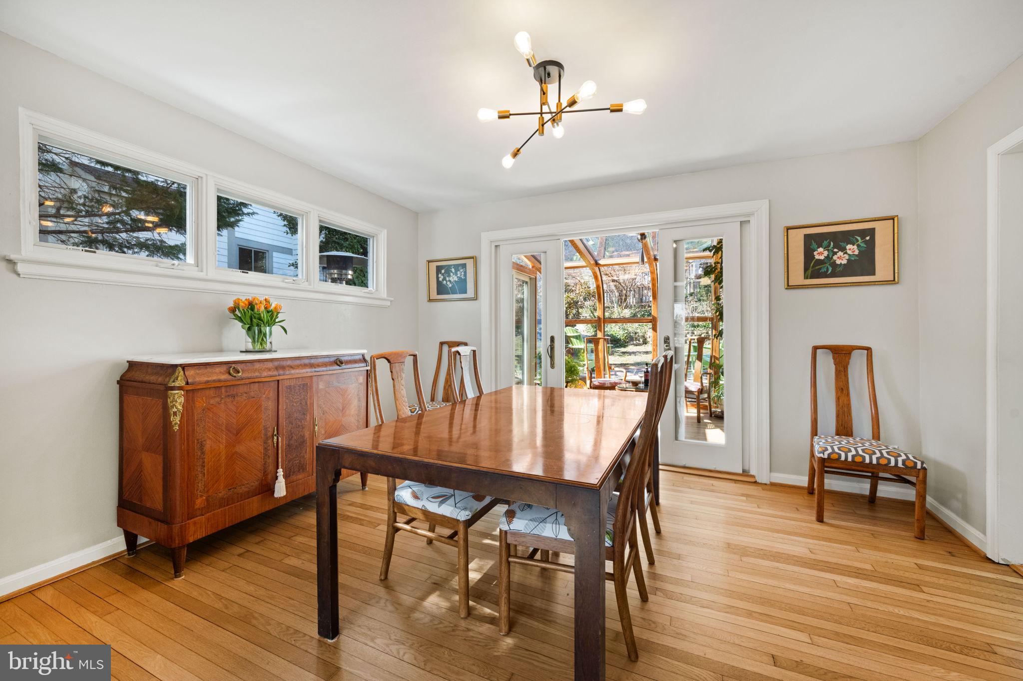 2904 Russell Road Alexandria, VA 22305 - Photo 8 of 52 a view of a dining room with furniture window and wooden floor