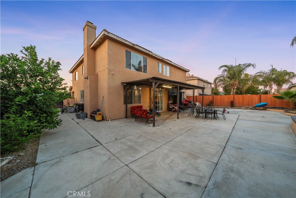 3807 Seattle Street Hemet, CA 92545 - Photo 33 of 38 a view of a house with backyard and sitting area
